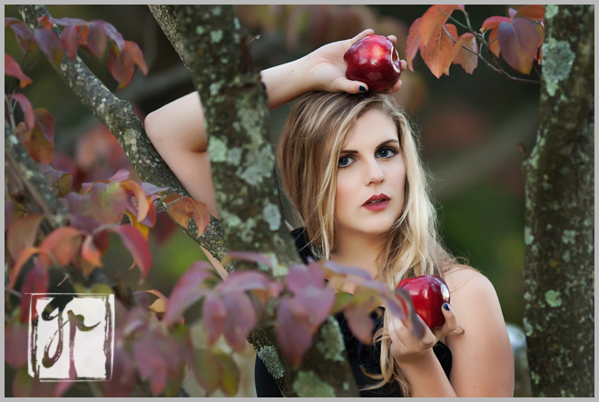 Beautiful Senior Girl Holding Red Apples