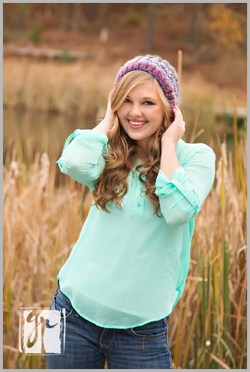 senior girl with purple hat