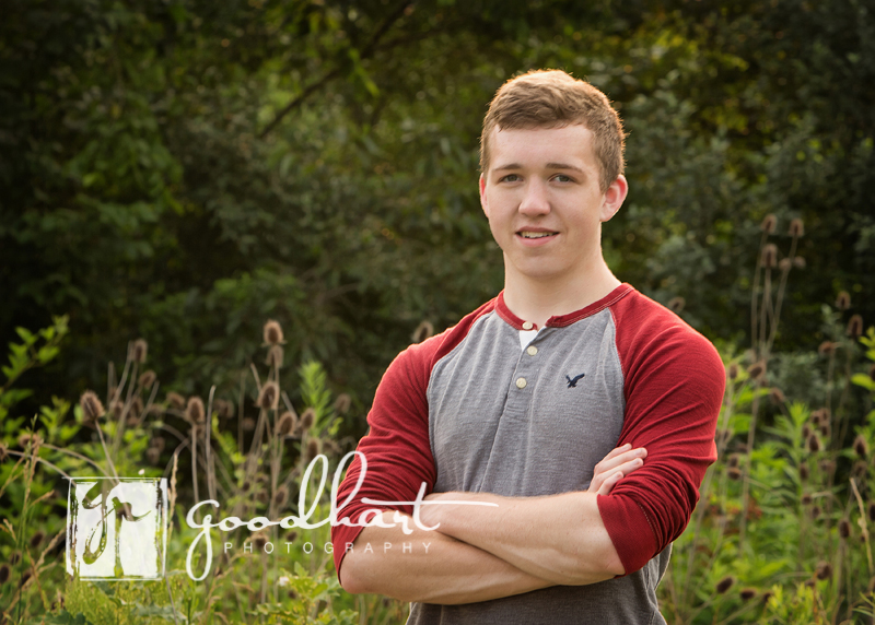 senior guy with folded arms