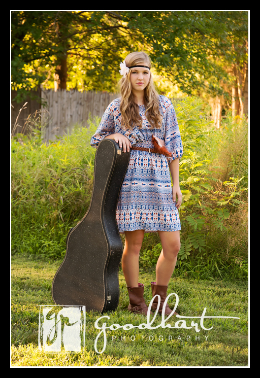 high school senior playing guitar